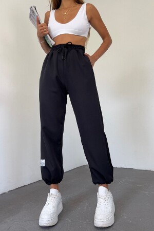 Damen-Hose/Jogginghose in Schwarz mit verstellbarem Bein und weitem Bein - 1