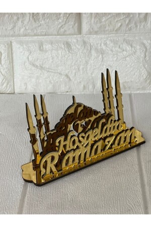 Goldener Serviettenhalter aus Plexiglas mit der Aufschrift „Welcome Ramadan“. - 1