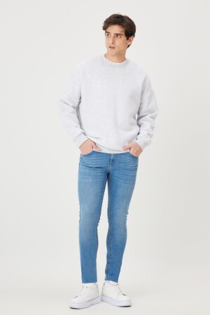 Hellblaue, extra schmal geschnittene Slim-Fit-Riss-Baumwoll-Jeans aus flexiblem Denim für Herren ET0100000002 - 3